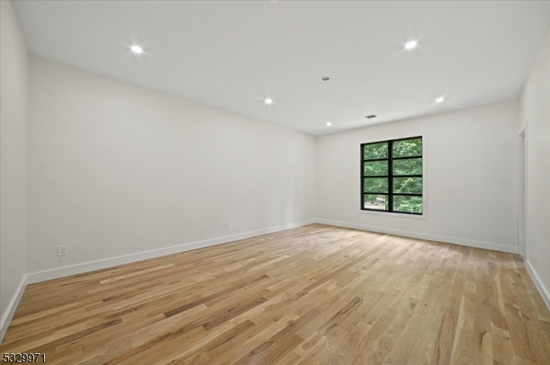 136 2 Mt Harmony Road Bernardsville, NJ 07924 - Photo 17 of 41 a view of an empty room with a window