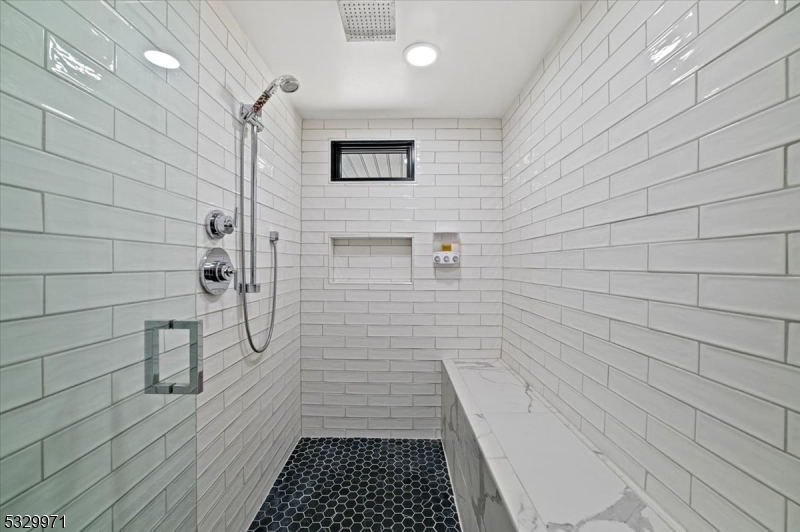 136 2 Mt Harmony Road Bernardsville, NJ 07924 - Photo 28 of 41 a bathroom with a shower