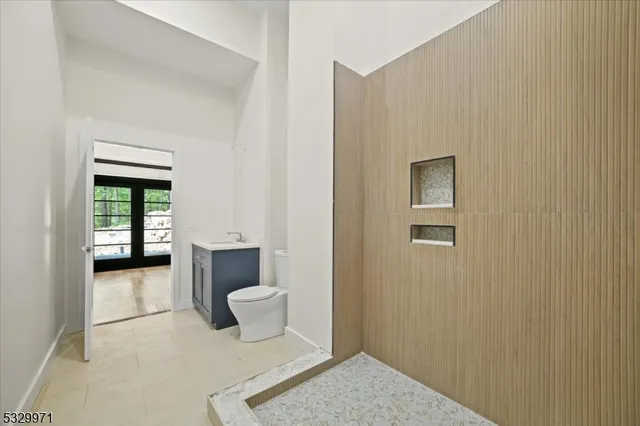 aerial view of a house with a garden