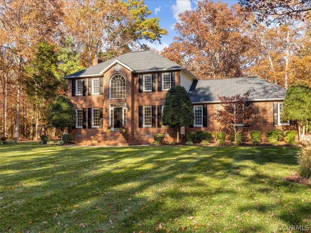 13630 Spring Run Road Midlothian, VA 23112 - Photo 1 of 30 a front view of a house with a garden