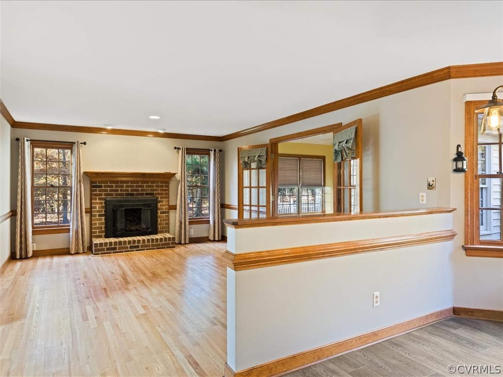 13630 Spring Run Road Midlothian, VA 23112 - Photo 17 of 30 a view of an empty room with wooden floor and a window
