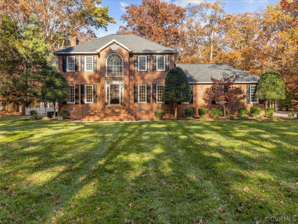 13630 Spring Run Road Midlothian, VA 23112 - Photo 2 of 30 a front view of a house with a yard