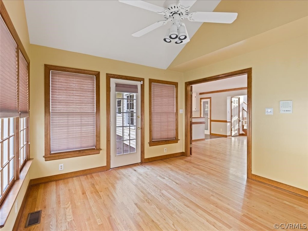 13630 Spring Run Road Midlothian, VA 23112 - Photo 22 of 30 a view of an empty room with a window and wooden floor