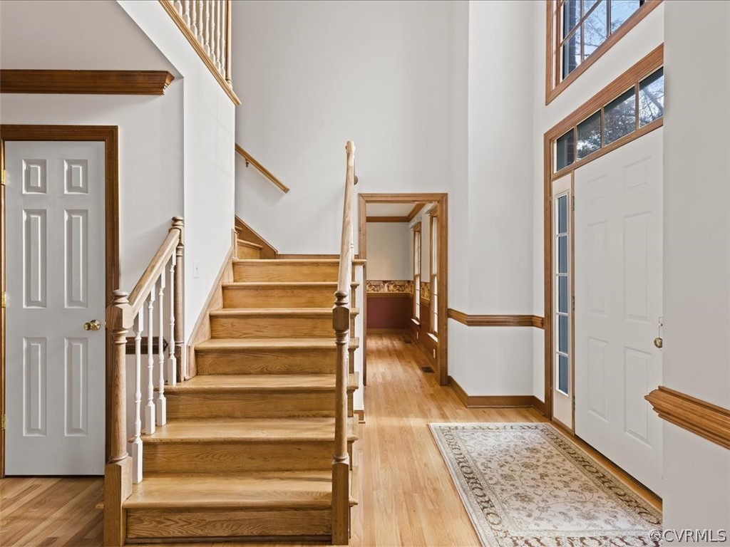 13630 Spring Run Road Midlothian, VA 23112 - Photo 10 of 30 a view of staircase with wooden floor and a rug