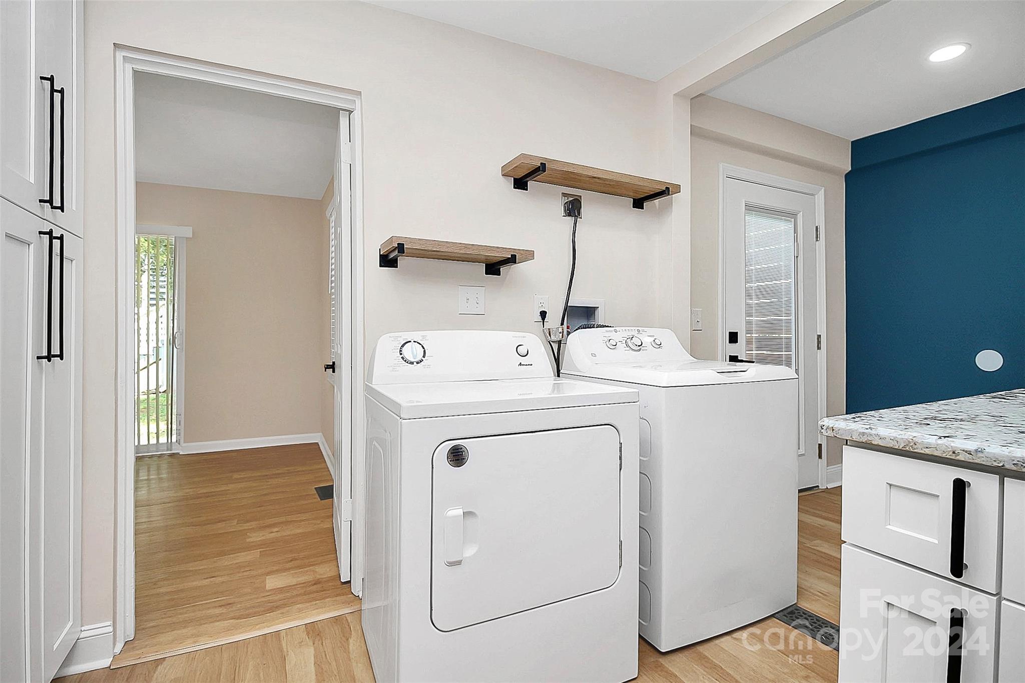 2742 Mayflower Road Charlotte, NC 28208 - Photo 14 of 37 a utility room with dryer and washer
