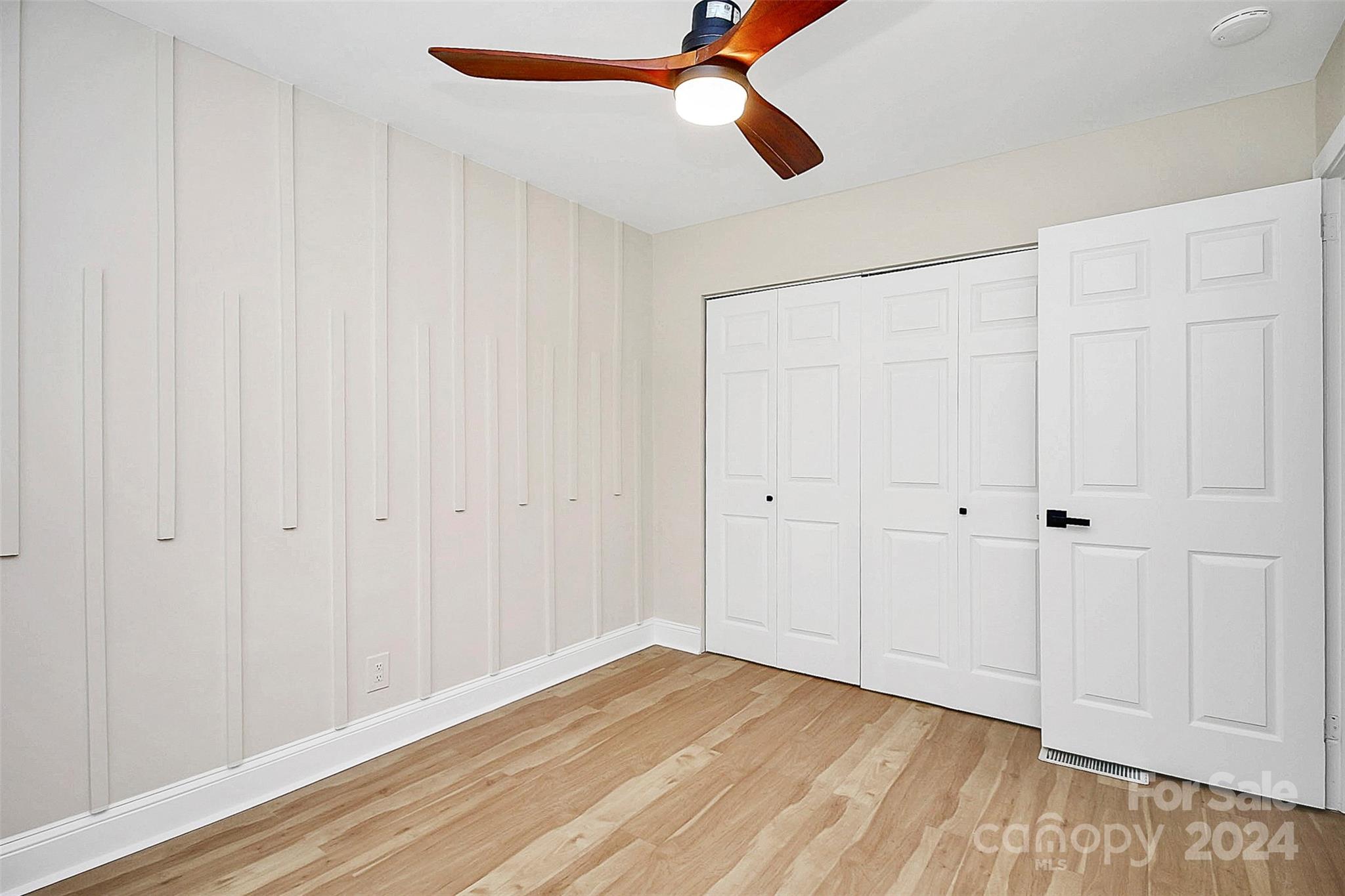 2742 Mayflower Road Charlotte, NC 28208 - Photo 30 of 37 a view of empty room with wooden floor