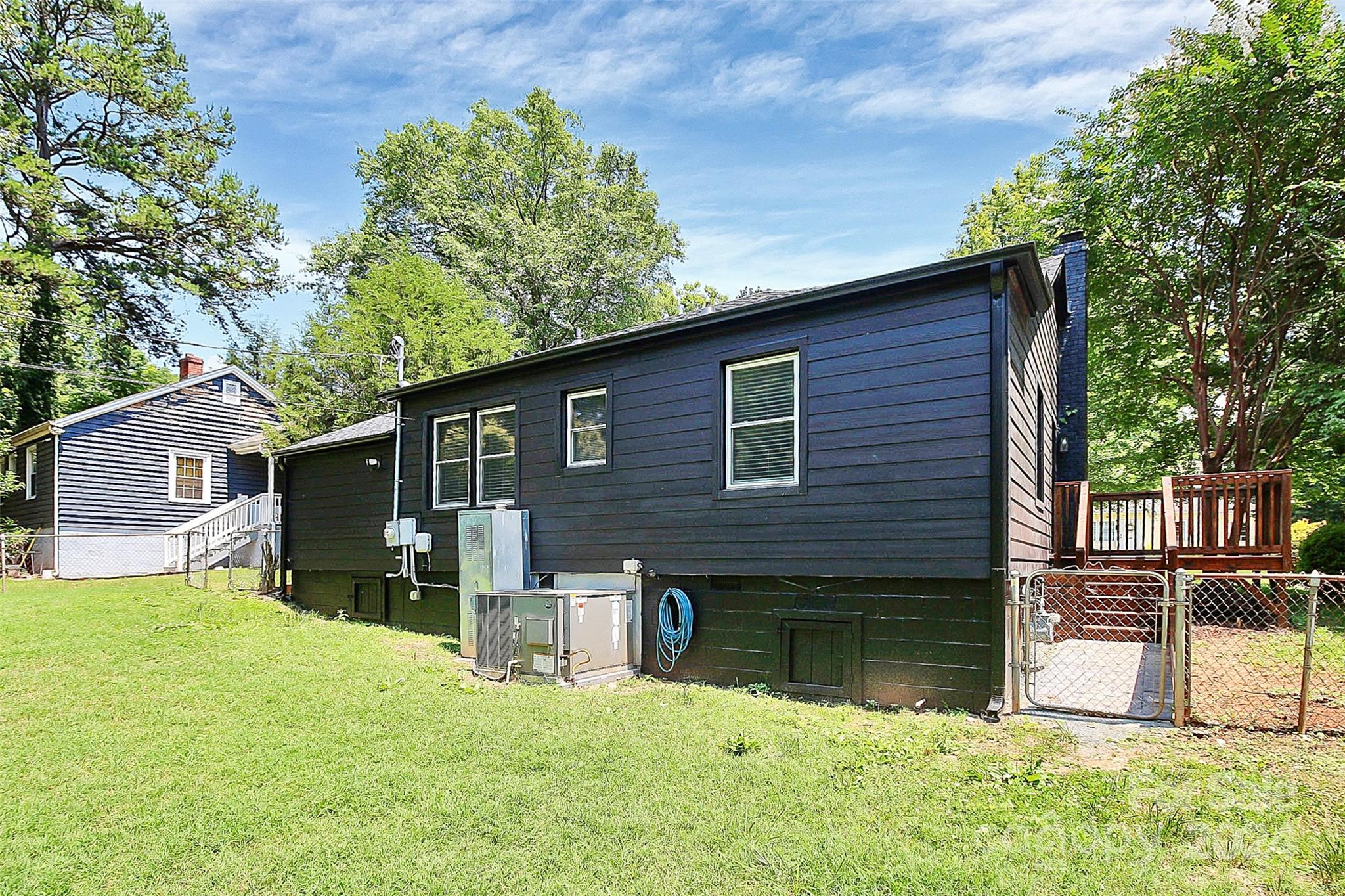 2742 Mayflower Road Charlotte, NC 28208 - Photo 32 of 37 a view of a house with a yard