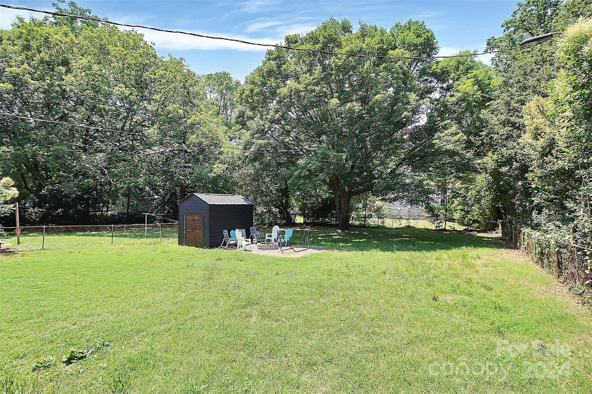 2742 Mayflower Road Charlotte, NC 28208 - Photo 34 of 37 a view of a backyard with swimming pool