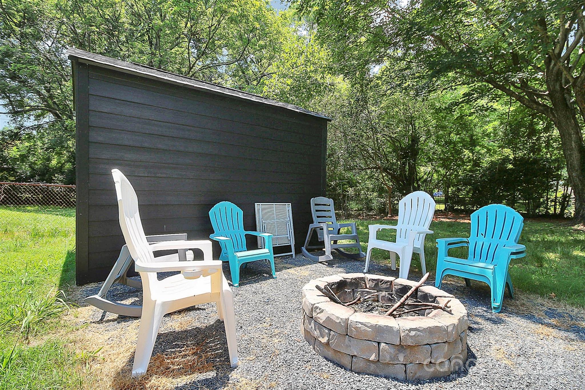 2742 Mayflower Road Charlotte, NC 28208 - Photo 37 of 37 a view of a chairs and table in the patio