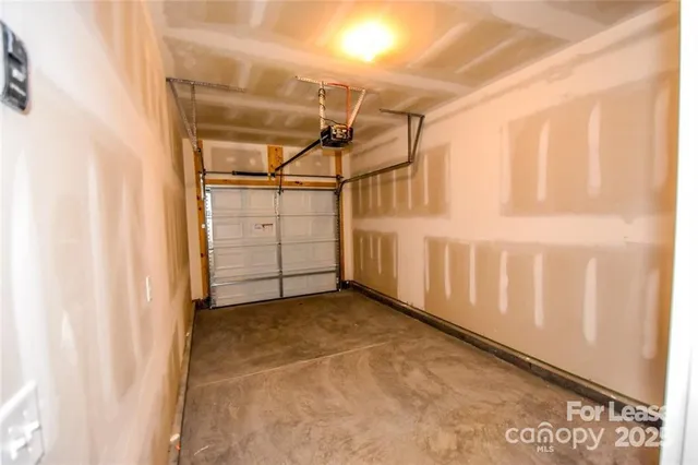 a view of a garage with wooden walls