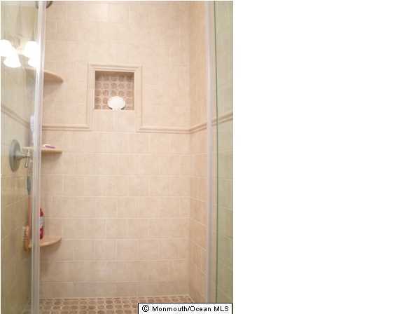 131 Launch Road Manahawkin, NJ 08050 - Photo 15 of 25 a bathroom with a shower