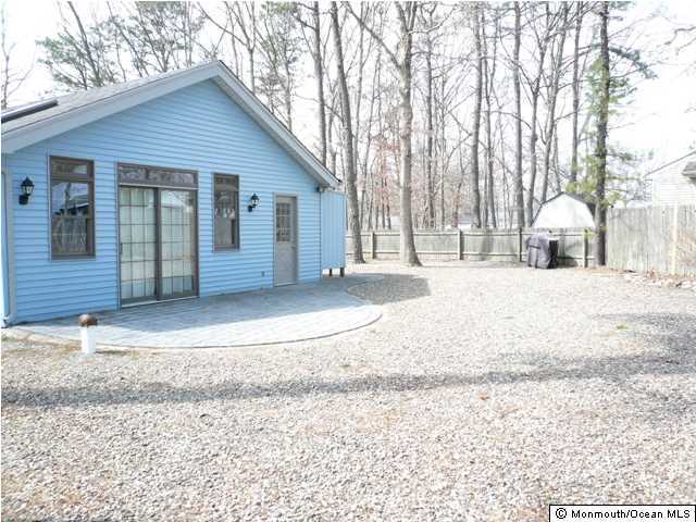 131 Launch Road Manahawkin, NJ 08050 - Photo 23 of 25 a view of a house with a patio