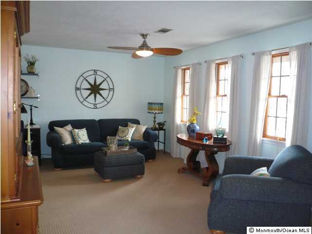 131 Launch Road Manahawkin, NJ 08050 - Photo 4 of 25 a living room with furniture and a large window