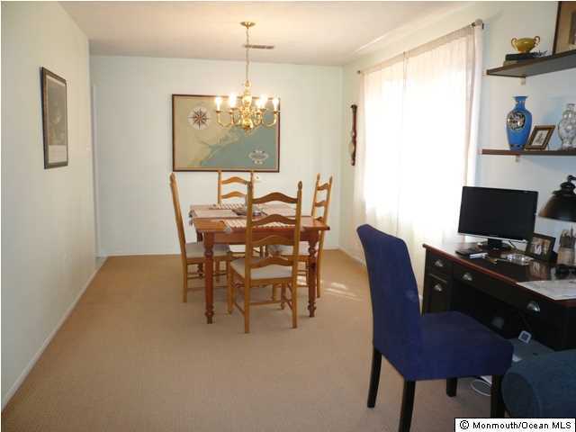 131 Launch Road Manahawkin, NJ 08050 - Photo 5 of 25 a view of a dining room with furniture