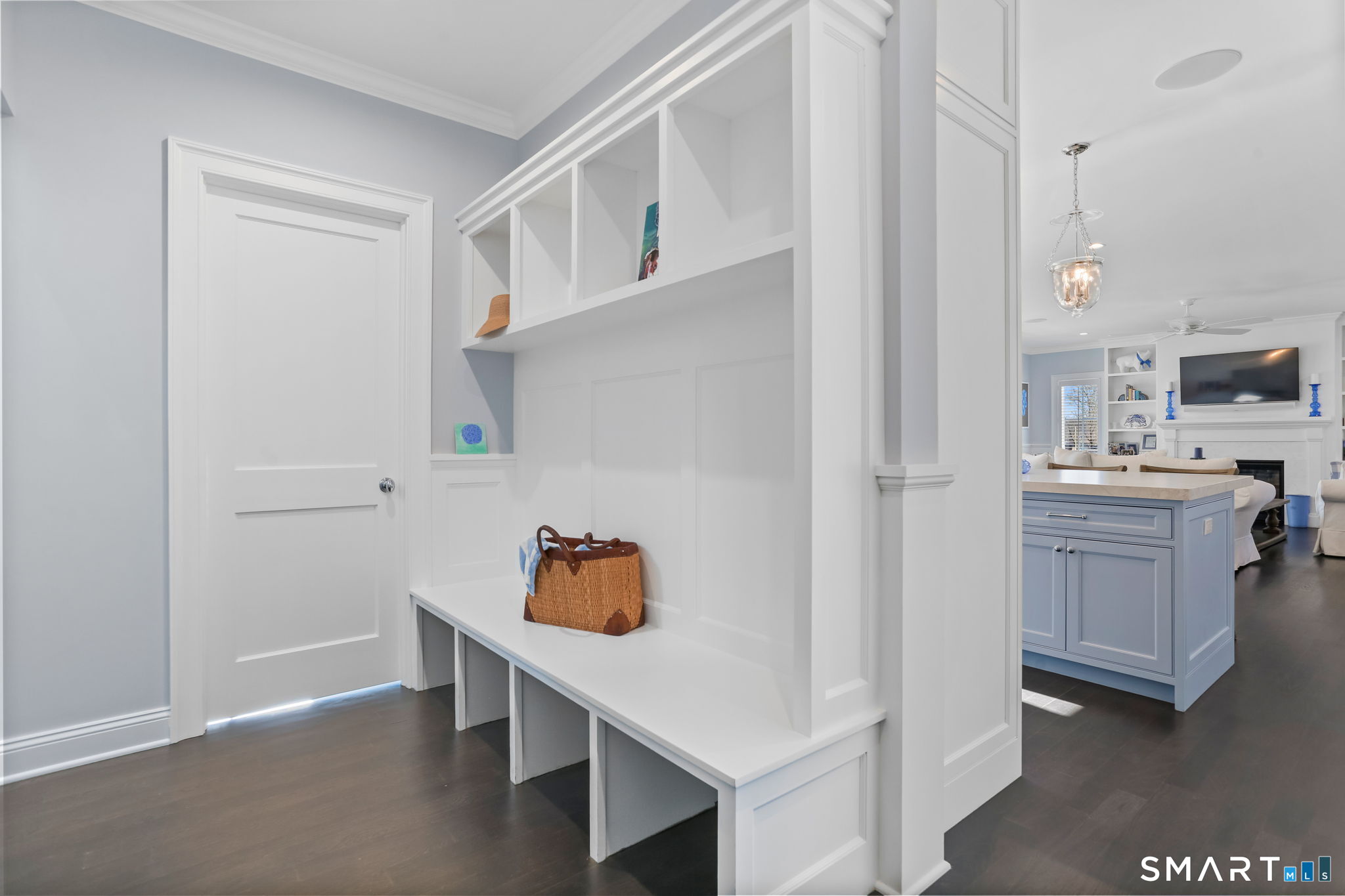 218 Lower Farm Road Fairfield, CT 06824 - Photo 20 of 40 Door in mudroom is large walk-in coat closet with window. Mudroom leads to garage and has stairs to bonus room.