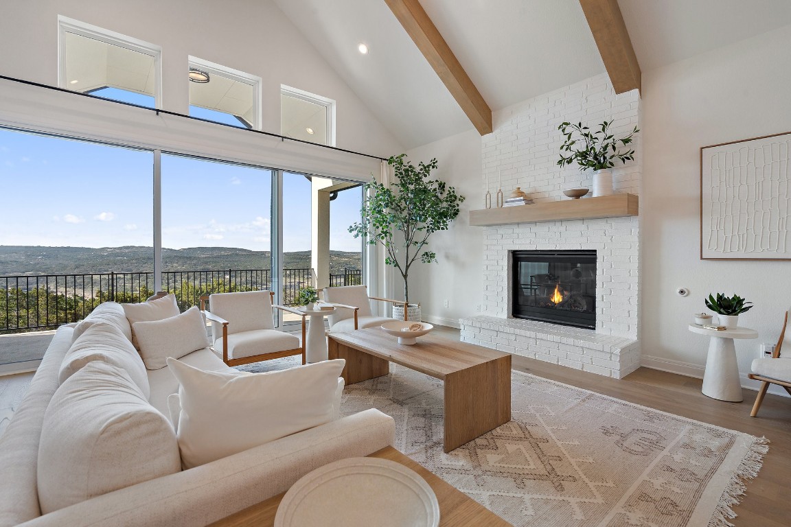 Enveloped in the Summit at Lake Travis, just blocks from the serene shores of Lake Travis and embraced by a lush greenbelt, this residence with over $350k in upgrades defines the pinnacle of hill country luxury living
