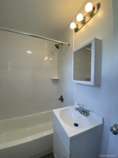 779 Neighborhood Road Lake Katrine, NY 12449 - Photo 3 of 7 Full bathroom with vanity and shower / washtub combination