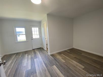 779 Neighborhood Road Lake Katrine, NY 12449 - Photo 5 of 7 Foyer with wood finished floors and baseboards