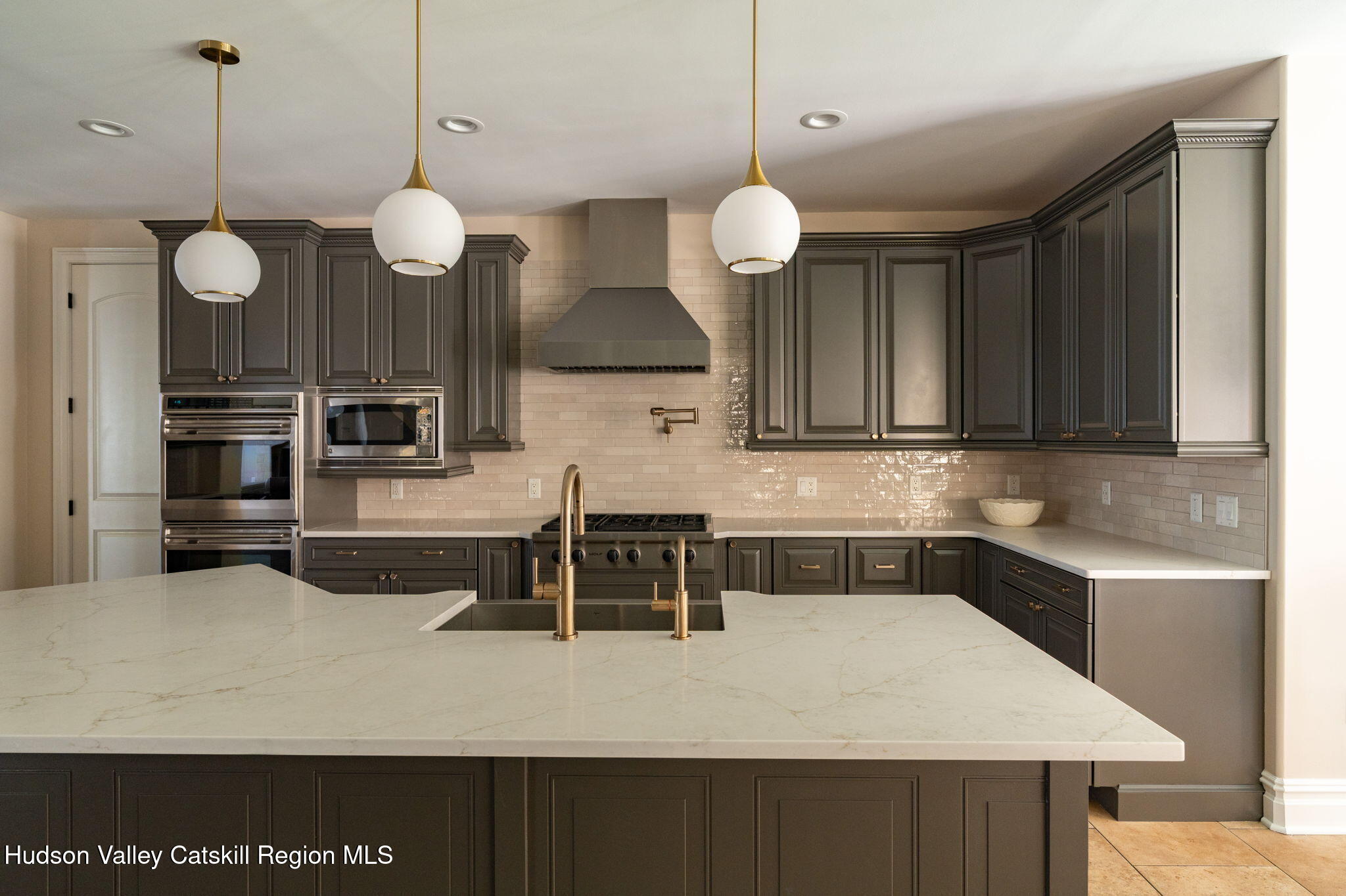 46 Idlewild Road Marlboro, NY 12542 - Photo 11 of 31 a kitchen with a table and chairs in it