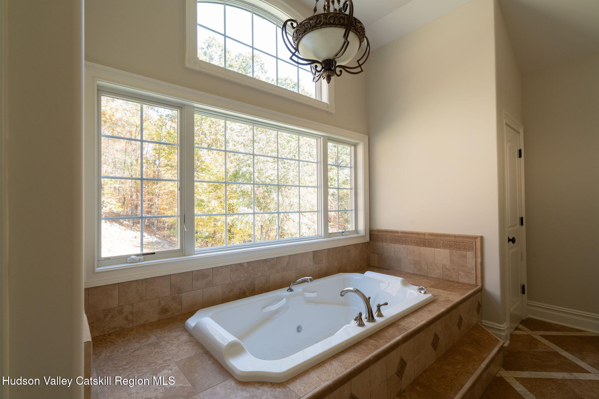 46 Idlewild Road Marlboro, NY 12542 - Photo 16 of 31 a bath tub sitting next to a window