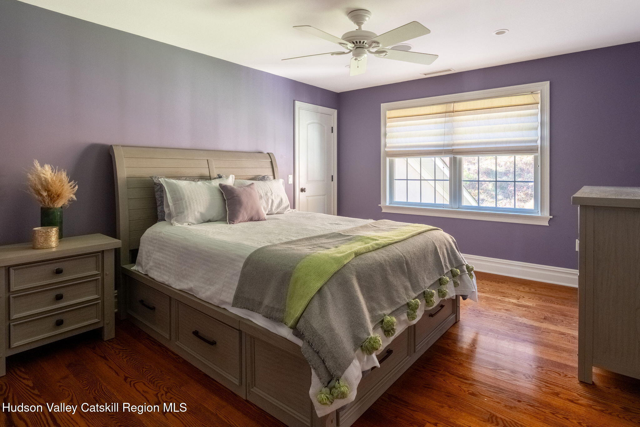 46 Idlewild Road Marlboro, NY 12542 - Photo 20 of 31 a bedroom with a bed a chandelier and a window