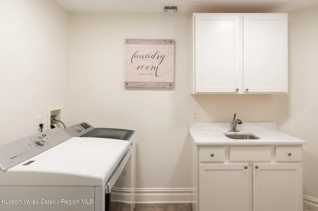 a aerial view of a house with a yard