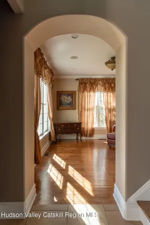 a view of an entryway with a livingroom