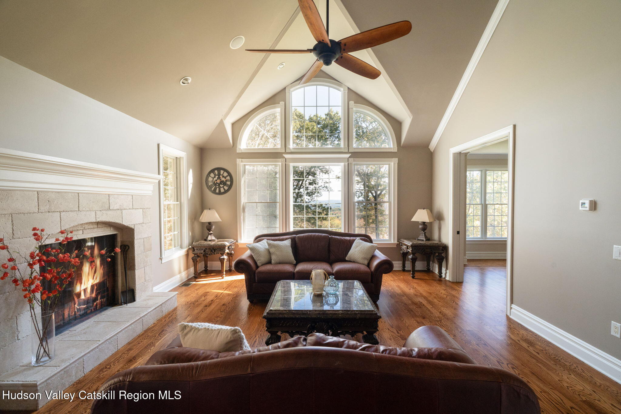 46 Idlewild Road Marlboro, NY 12542 - Photo 6 of 31 a living room with furniture a fireplace and a large window