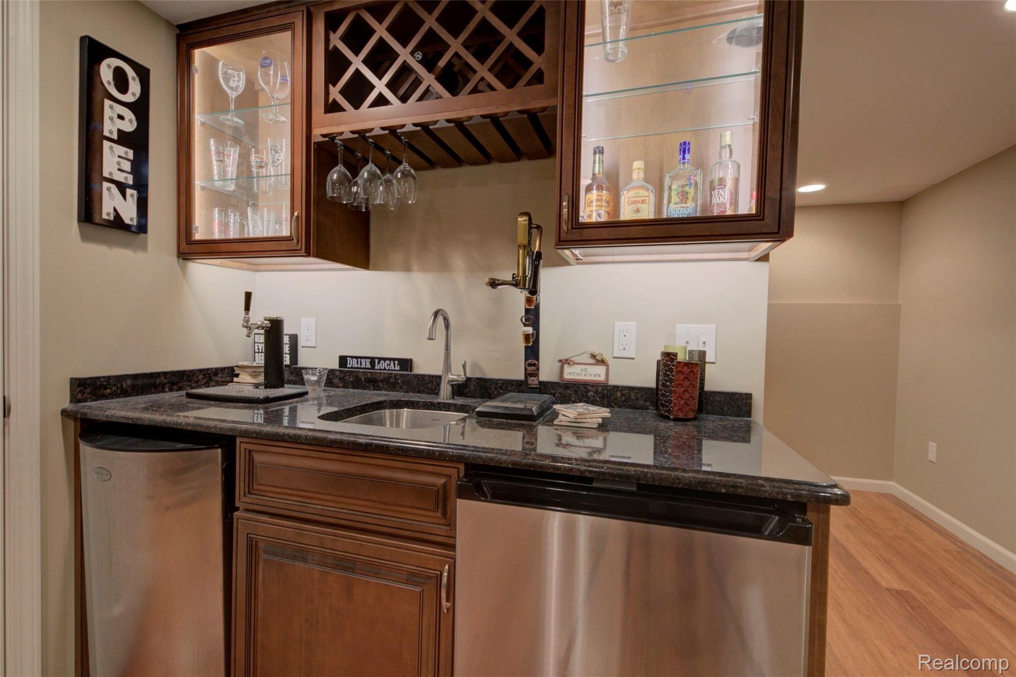 1161 Pine Ridge Court, Unit 143 Rochester, MI 48306 - Photo 31 of 45 CUSTOM WET BAR.