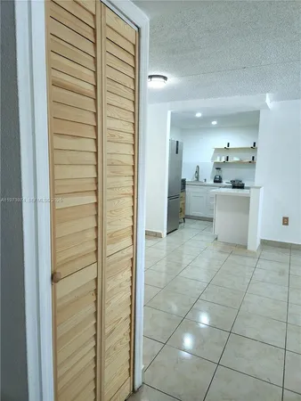 a bathroom with a mirror and a shower