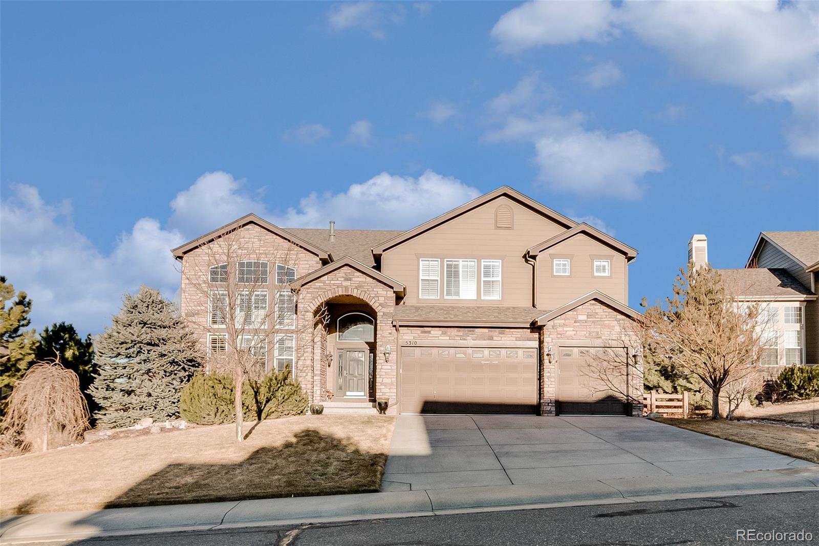 5310 Streambed Trail Parker, CO 80134 - Photo 2 of 35 a view of house and outdoor space