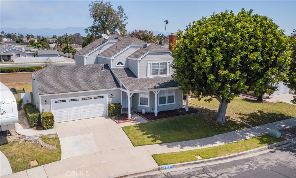 an aerial view of a house with garden