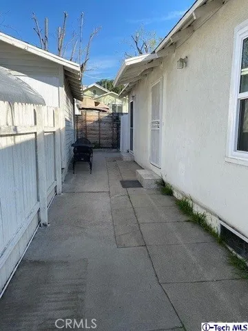 a close view of a utility room with dryer and washer