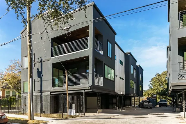 a view of a street with buildings