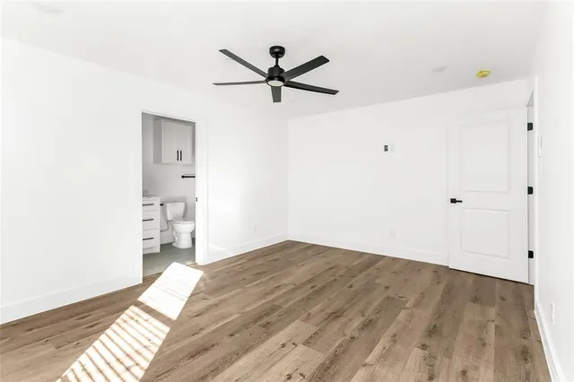 a view of a big room with wooden floor