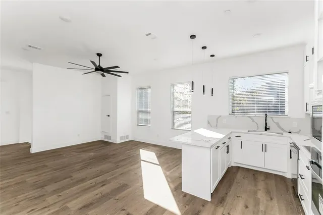 a view of a kitchen sink and a dishwasher