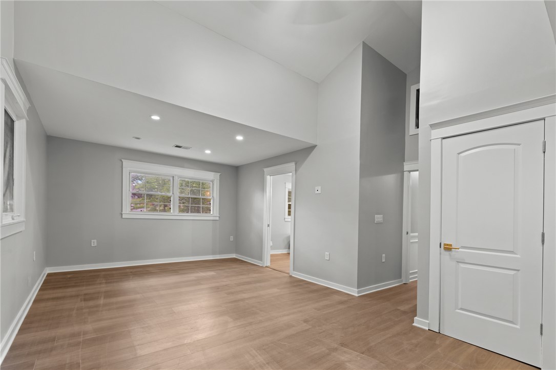 309 Woodland Way Clemson, SC 29631 - Photo 23 of 43 This airy room features elegant flooring, ample windows, and recessed lighting for a bright ambiance.
