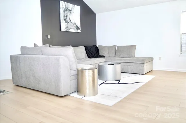 a kitchen with stainless steel appliances a refrigerator and a sink