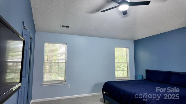 a view of livingroom with hardwood floor and hallway