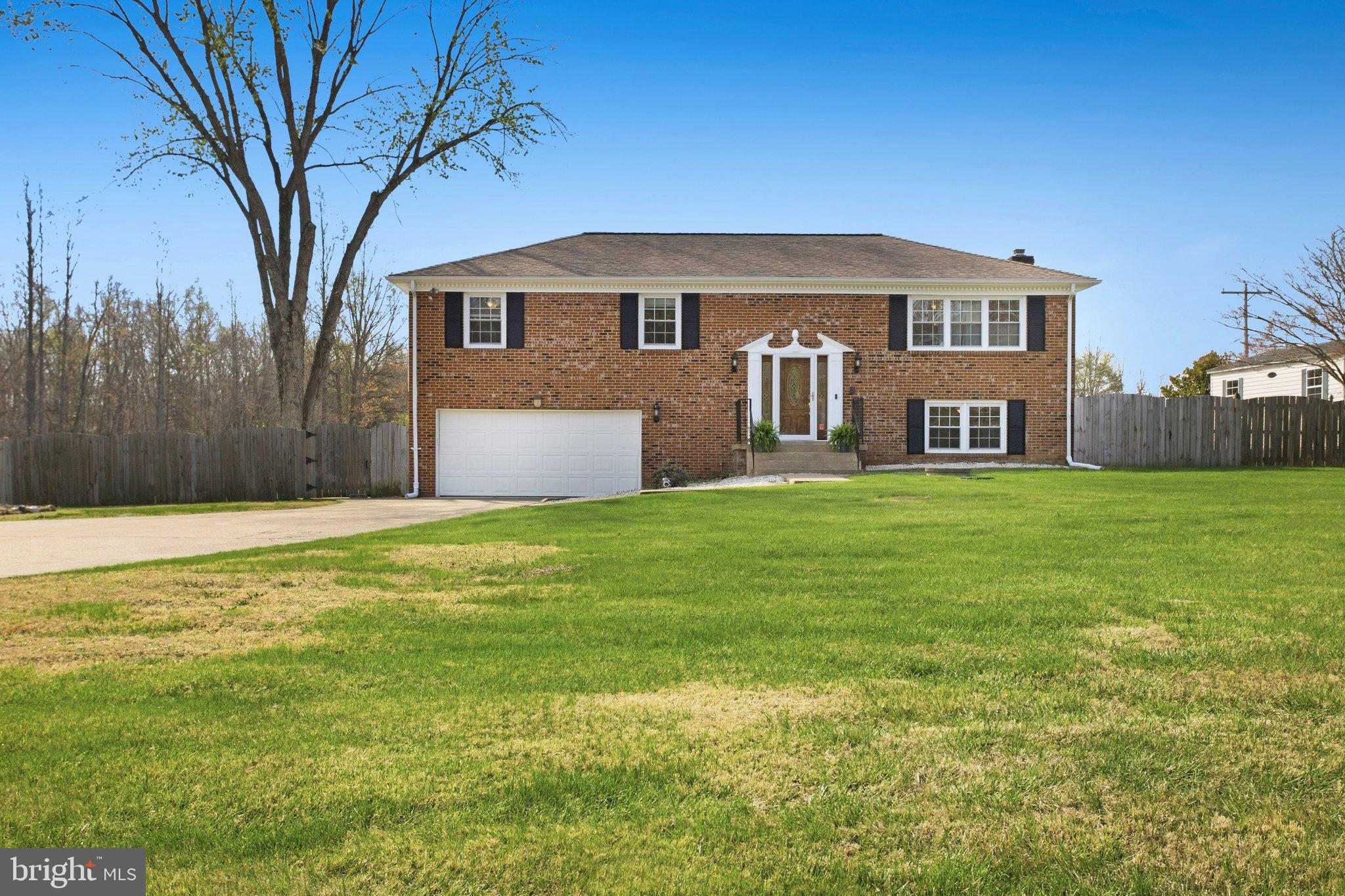 Charming brick home with spacious yard.