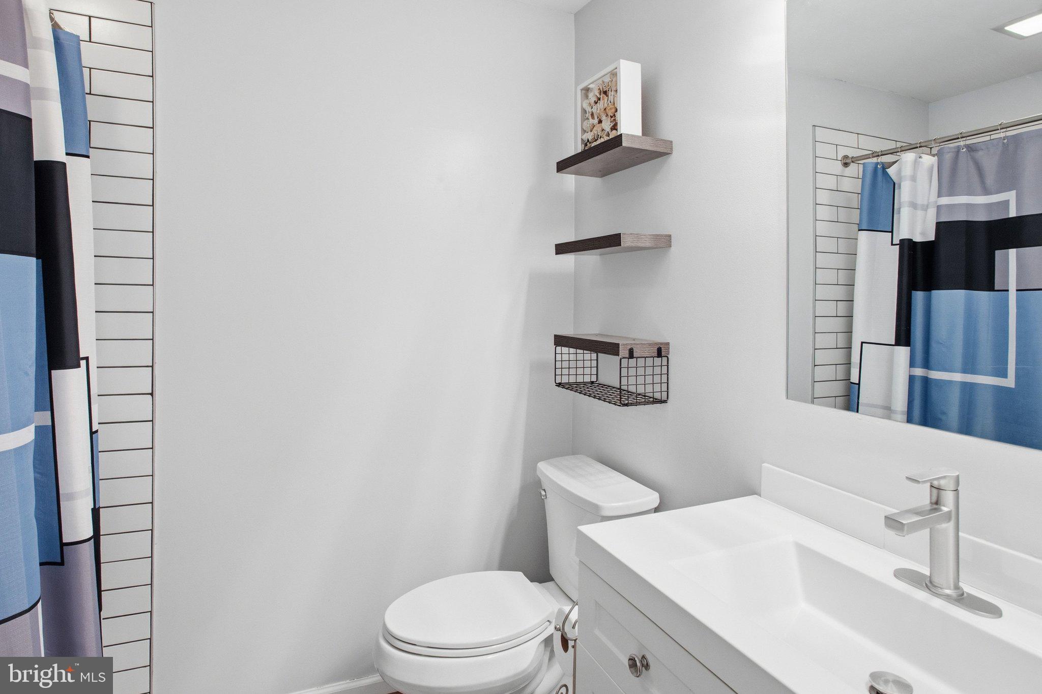 331 Joshua Road Stafford, VA 22556 - Photo 14 of 38 Modern bathroom with sleek design.