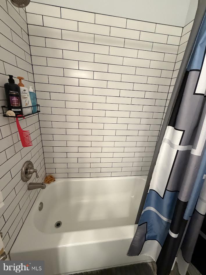 331 Joshua Road Stafford, VA 22556 - Photo 15 of 38 Modern bath with sleek tile design.