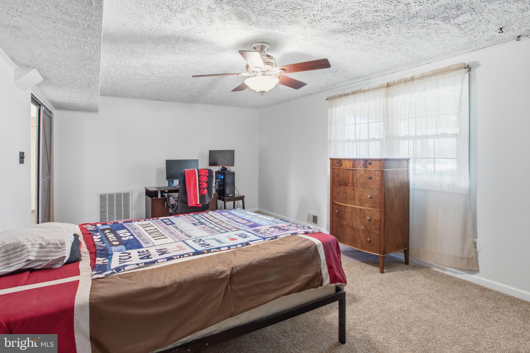 331 Joshua Road Stafford, VA 22556 - Photo 29 of 38 Cozy bedroom with natural light.