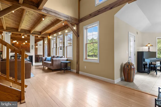 a living room with a couch and a window