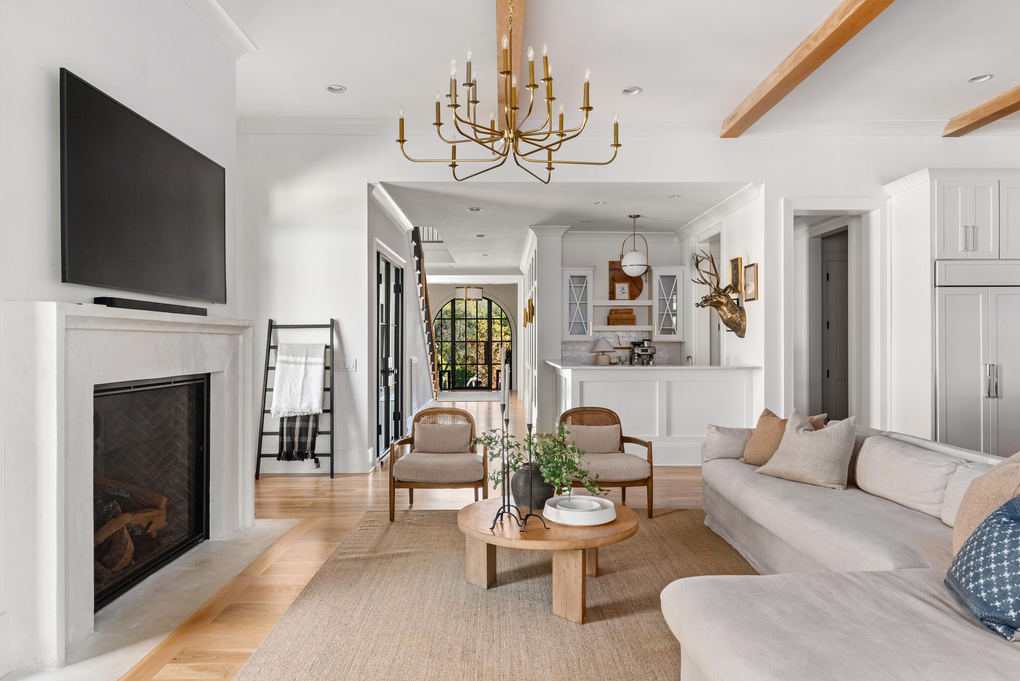 9021 Passiflora College Grove, TN 37046 - Photo 17 of 84 a living room with furniture a flat screen tv and a fireplace