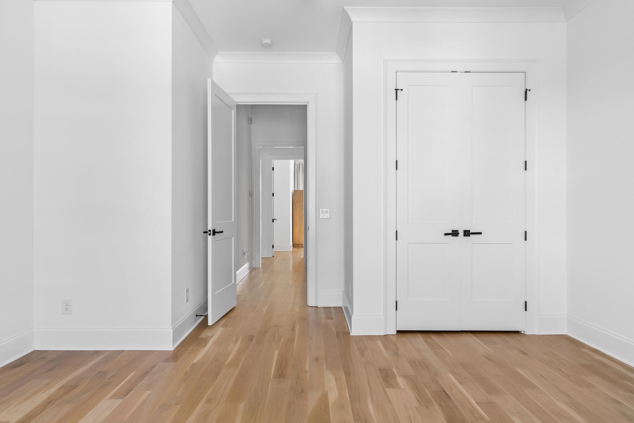 9021 Passiflora College Grove, TN 37046 - Photo 75 of 84 a view of a hallway with wooden floor