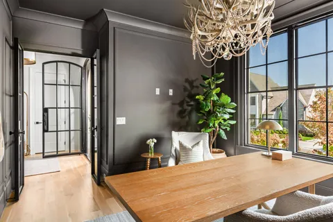a kitchen with a stove and cabinets