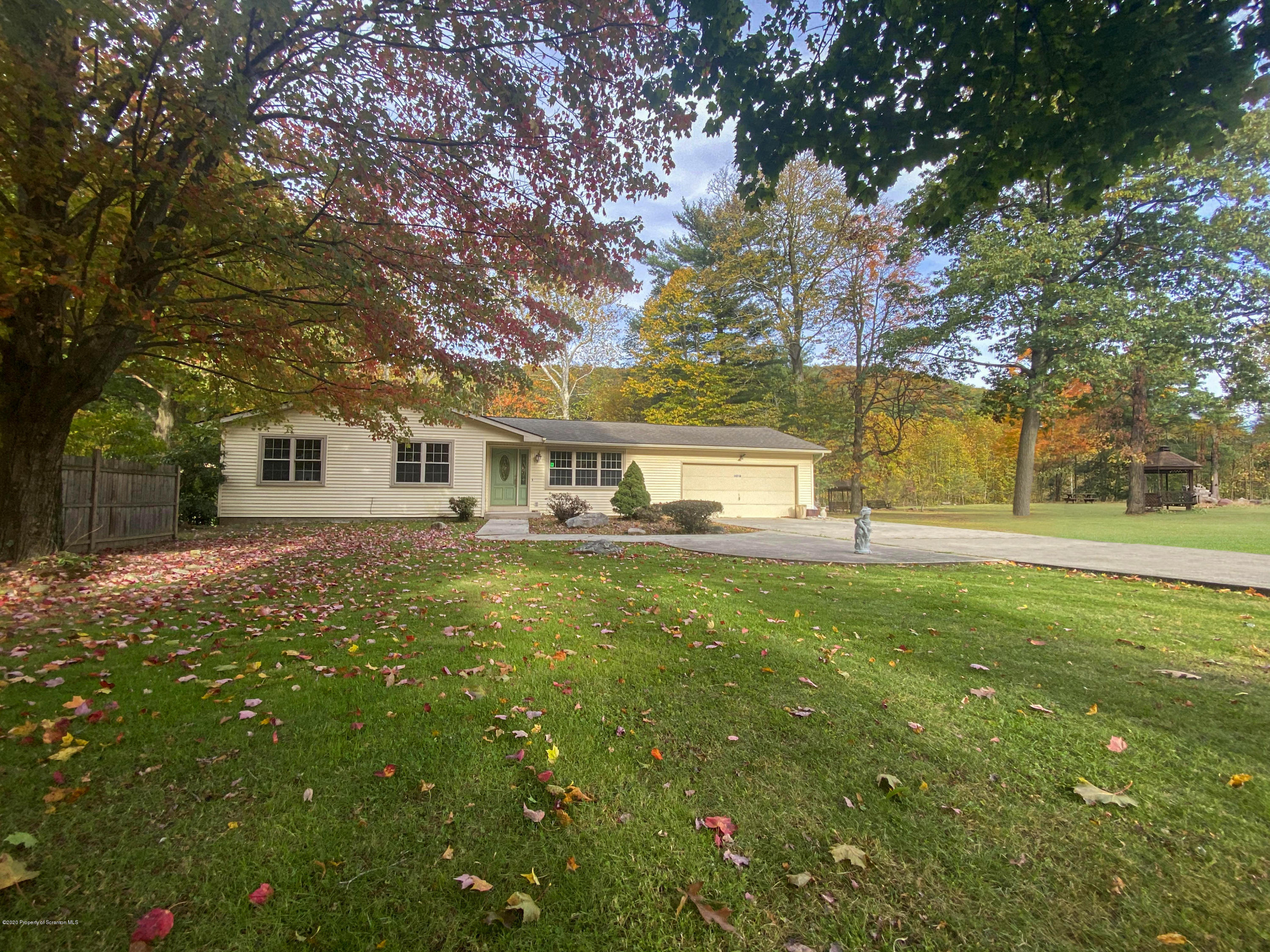 2108 Glendale Road Pittston, PA 18640 - Photo 6 of 32 a front view of a house with a yard