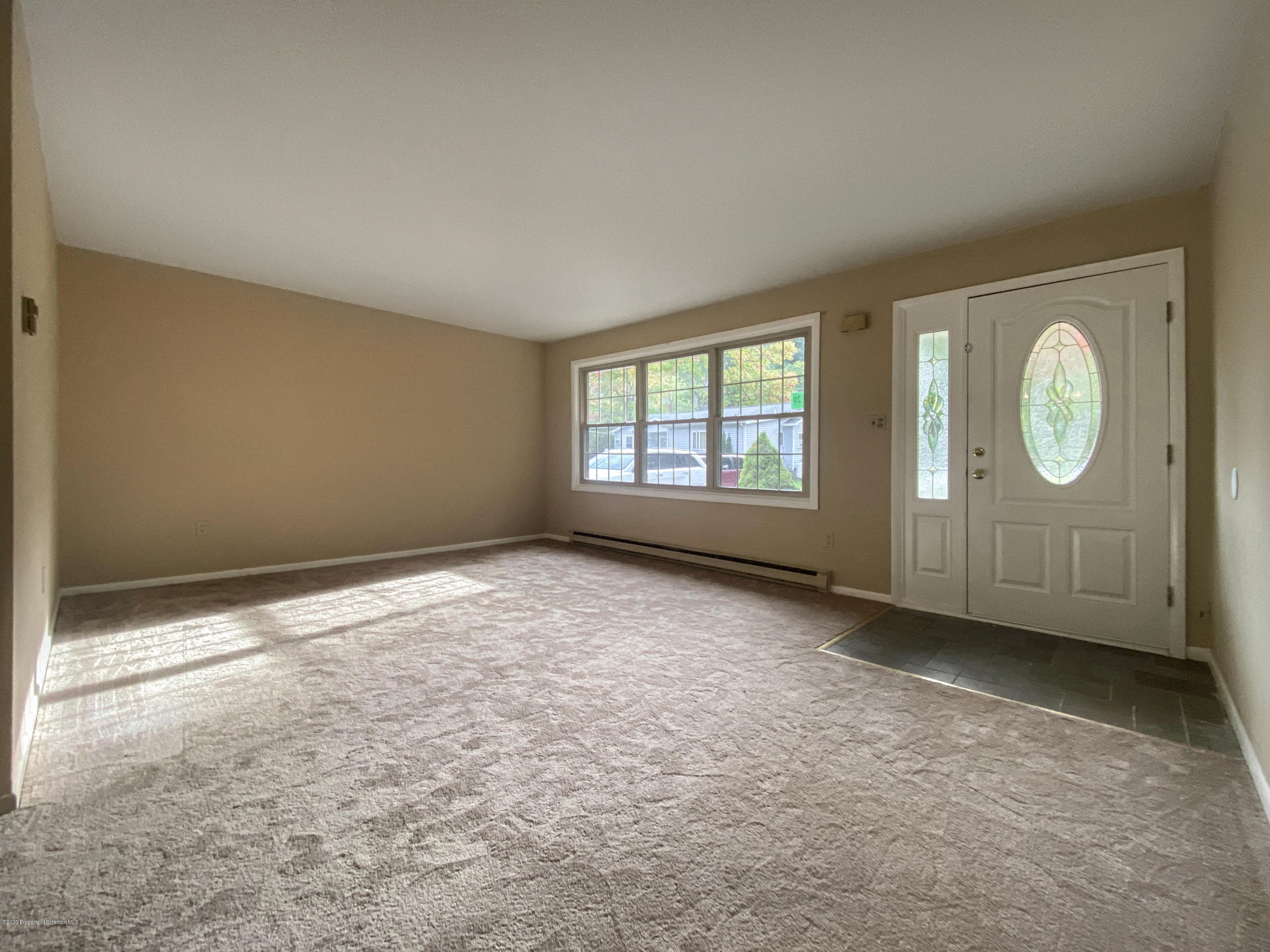 2108 Glendale Road Pittston, PA 18640 - Photo 8 of 32 an empty room with windows