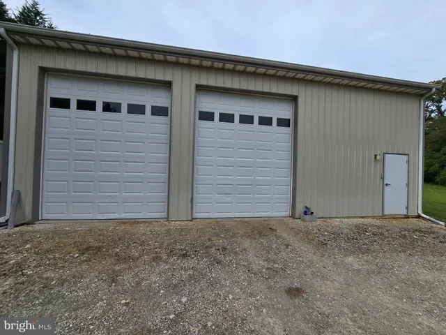 a view of a car with a car parked